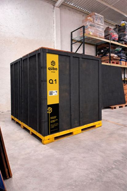 A sealed qübo vault with its clips closed.